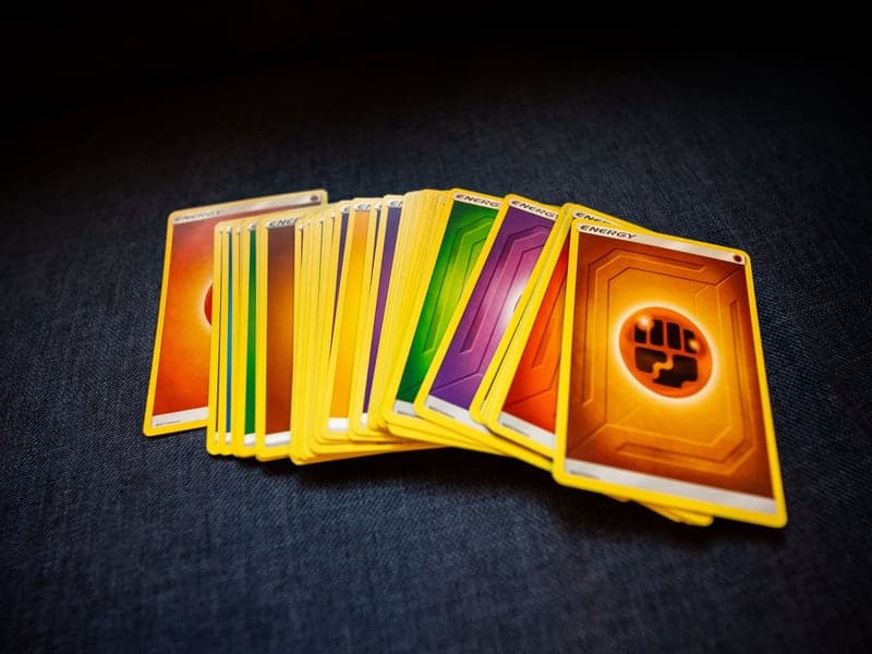 Colorful trading cards arranged on a flat surface