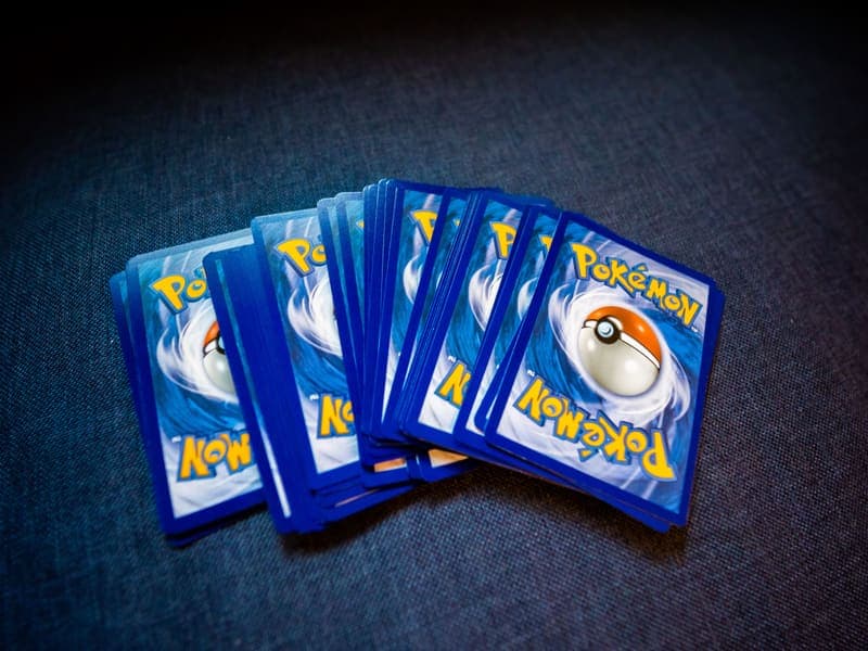 An assortment of trading cards viewed from above