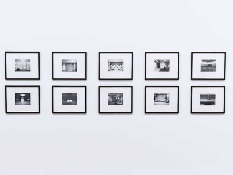 A wall display of simply framed pictures